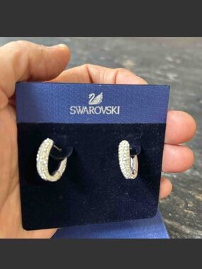 Swarovski Gold-Tone Pavé Crescent Hoop Earrings